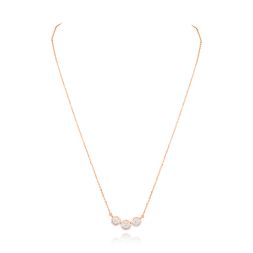 Crafted in rose gold, this geometric diamond necklace shimmers with festive brilliance, perfect for the woman who loves modern elegance.