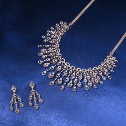 Expansive Chandelier Diamond Earrings and Rose Gold Necklace